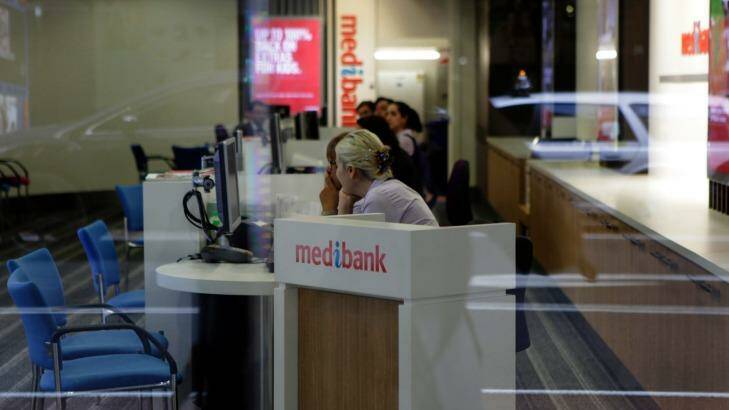 Take a number, but don't wait too long. You have until midnight to apply for Medibank shares. Photo: Michel O'Sullivan