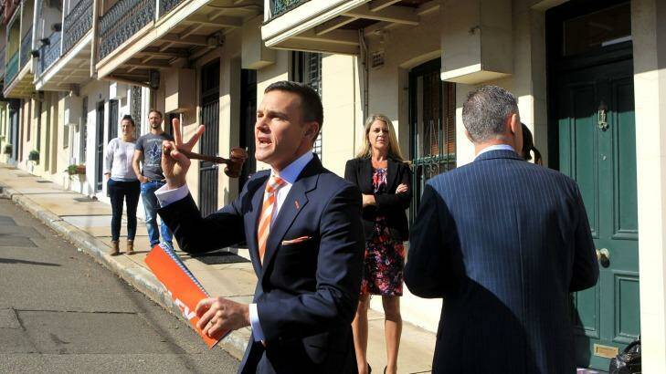 Auctioneer Damien Cooley at auction of 6 Gordon Street, Randwick, owned by former Federal Labor Minister and Midnight Oil vocalist Peter Garrett. Photo: James Alcock