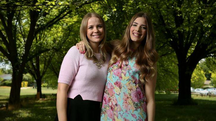 Filling the gap: Kaitlyn Young and Emily Kerr-Laslett from Canberra will be travelling to the UK to work as casual teachers. Photo: Alex Ellinghausen