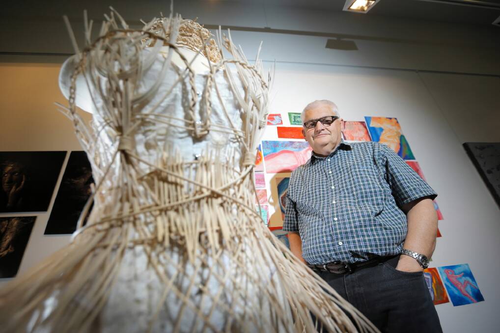 James Fallon High School art teacher John Skillington, who is retiring at the end of the year, officially opened an exhibition of HSC art works last night at the Lavington Library. Picture: TARA GOONAN
