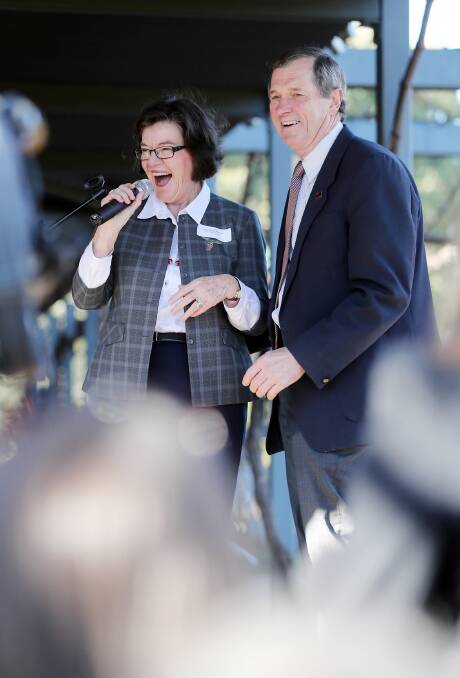 Cathy McGowan, accompanied by Bill Sykes, addresses guests at the Feathertop Winery.