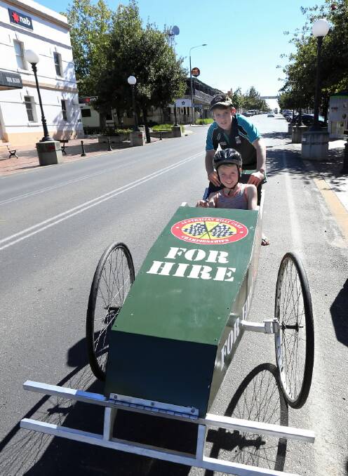 Bailey Minogue and Darcy Melksham, both 11, are raring to go for Saturday’s billy cart titles at Corowa. Picture: PETER MERKESTEYN
