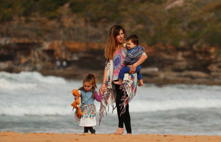 Marian Russell walks with her two children Allegra and Bodie at Warriewood beach on August 31,  2017 in Sydney, Australia.  (Photo by Daniel Munoz/Fairfax Media)