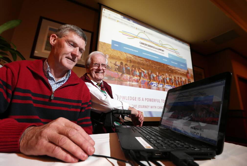 Peter Tobin and Eric Turner at the launch of the new website. Picture: JOHN RUSSELL