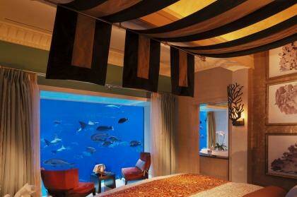 Luxe deluxe: the  two "underwater" suites feature floor-to-ceiling windows directly onto the aquarium.
