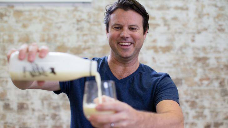 Saxon Joye, founder of Made By Cow, is selling cold-pressed raw milk. Photo: Edwina Pickles