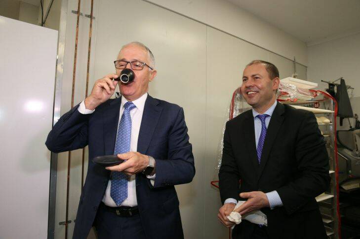 Prime Minister Malcolm Turnbull downs a double espresso when he visited The Baker at Sutton with minister Josh Frydenberg on Wednesday 25 October 2017. Fedpol. Photo: Andrew Meares 