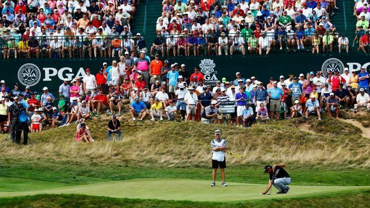 Packed gallery: Jason Day lines up a putt on the sixth hole during the final round of the 2015 PGA Championship at Whistling Straits. Photo: Jamie Squire