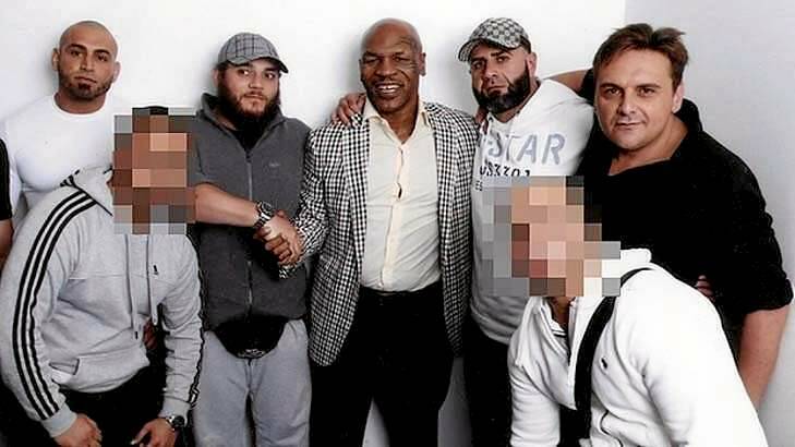 Khaled Sharrouf (in dark grey top) with Mike Tyson and George Alex (far right). Photo: Leigh Henningham