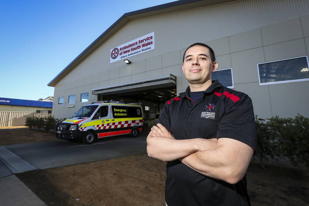 FED UP: Australian Paramedic Association representative and Albury paramedic James Kydd says lives are being put at risk, with paramedics sent on long-distance patient transport. Picture: JAMES WILTSHIRE