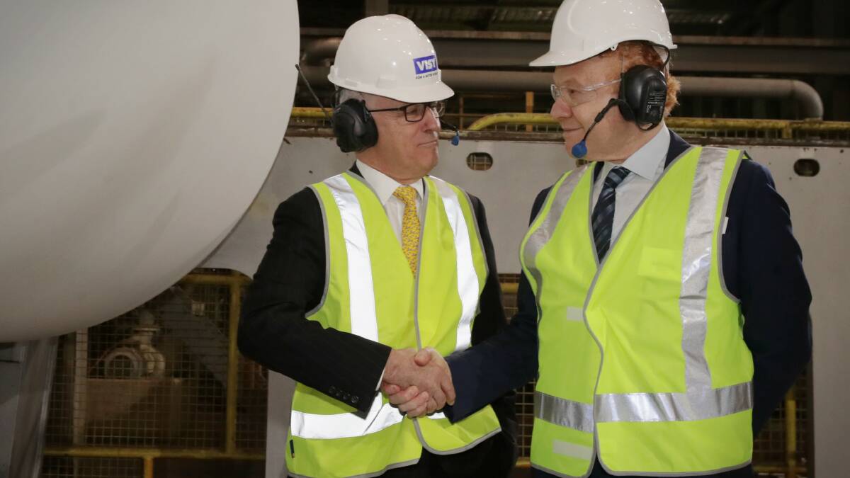 GOOD WORK: PM Malcolm Turnbull and Visy chairman Anthony Pratt at Tumut on Wednesday. Picture: FAIRFAX MEDIA
