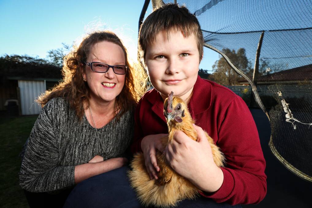 SUPPORT: Alec Tait, 11, with mother Jen Tait. Alec is one of hundreds who will benefit from the NDIS in Wodonga. Picture: JAMES WILTSHIRE