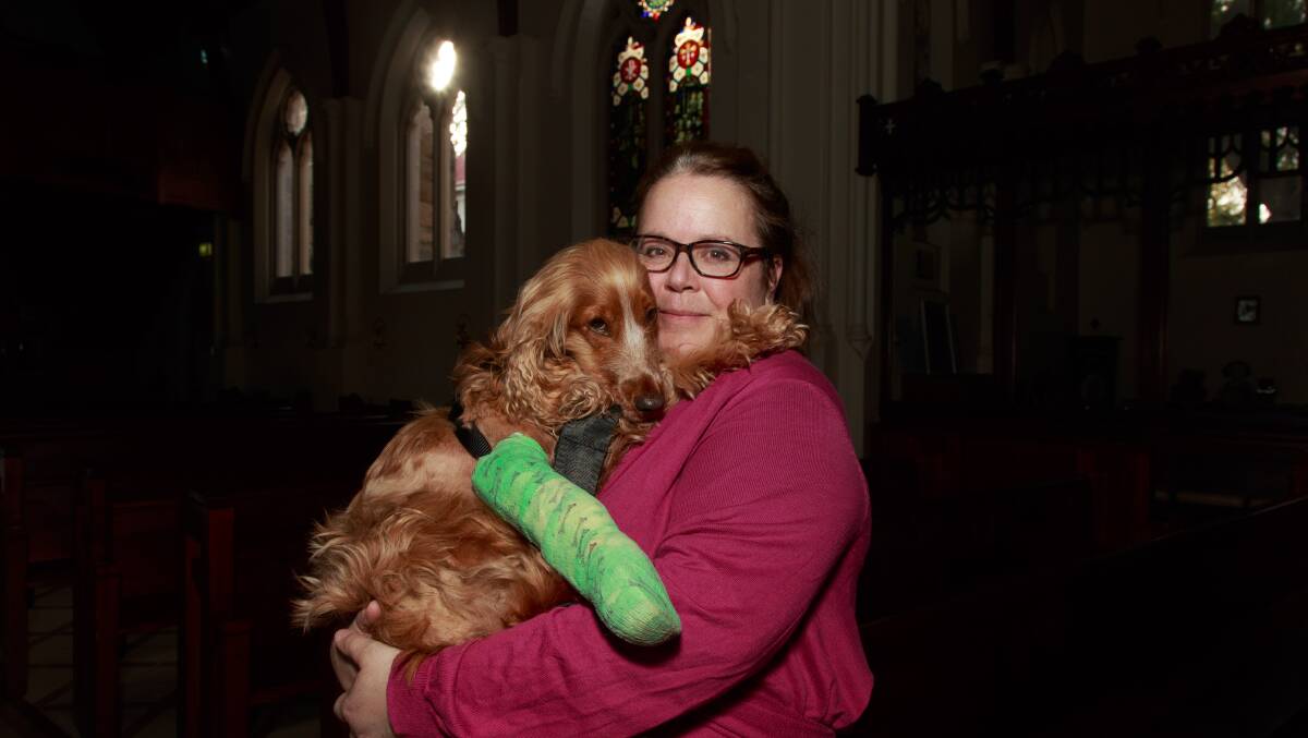 FAMILY: Erika Grimes and Georgie at St Matthew's church where they visit each week and where a fundraiser will be held on July 29 from 12pm. Picture: SIMON BAYLISS