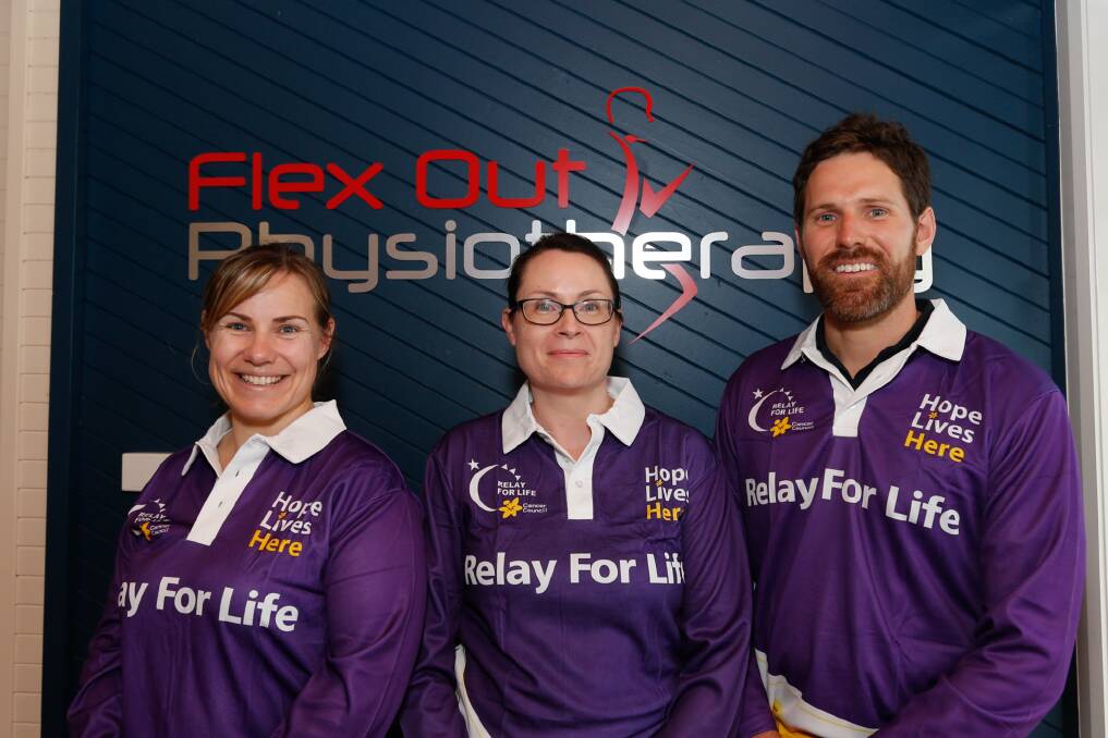 ONE WEEK: Susan Stokes, Emma Pearce and Liam James from Flex Out Physiotherapy who are helping participants track their laps. Picture: SIMON BAYLISS