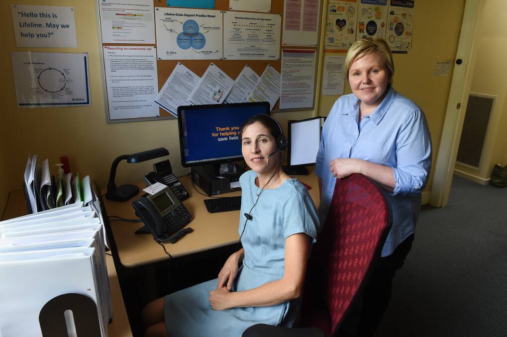VOLUNTEER: Jo Goodwin with Lifeline Albury Wodonga crisis support coordinator Stacy Read. The pair are calling of people to step up and volunteer. picture: MARK JESSER