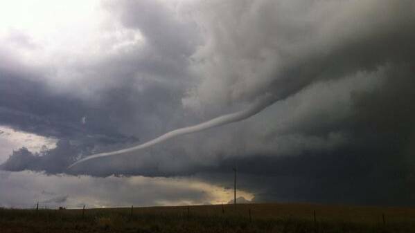 Lucy Stevenson was travelling back to Canberra from family Christmas celebrations when they spotted this storm coming in north of Cooma.