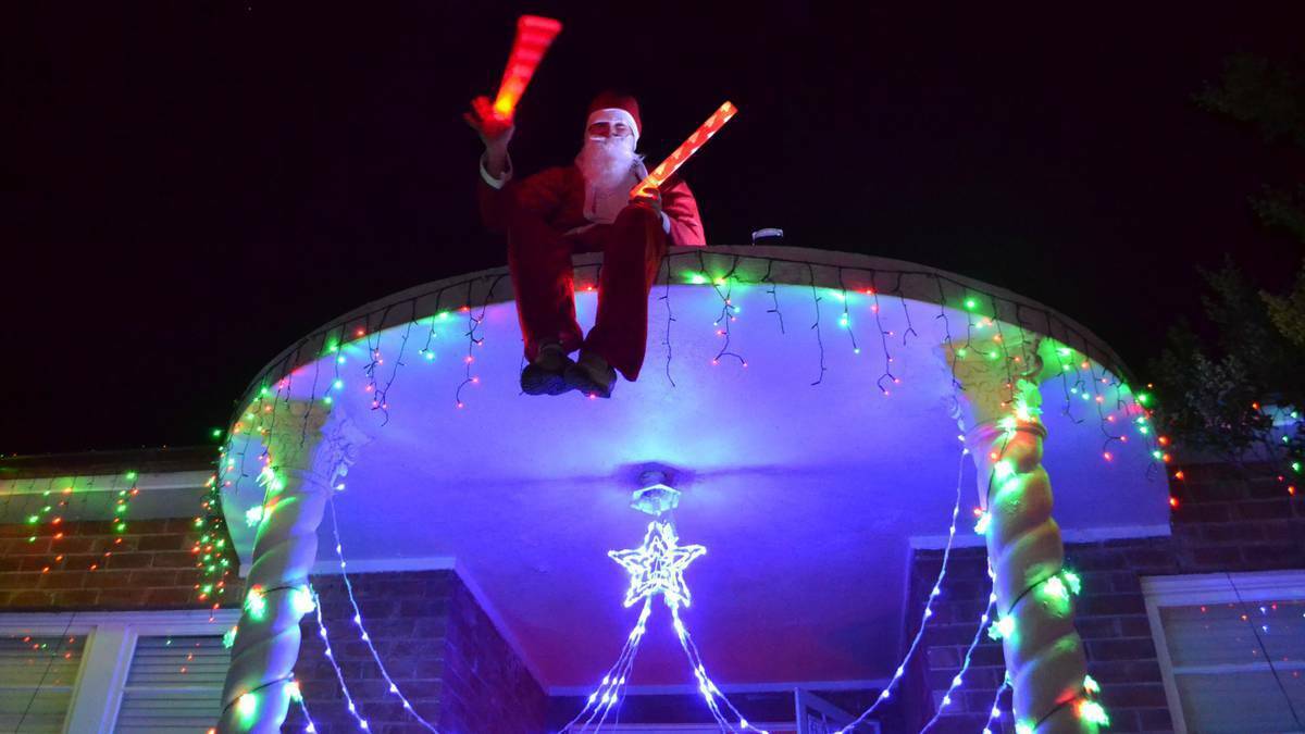 Santa Claus was touring the streets of Cowra, NSW to judge the best decorated houses.