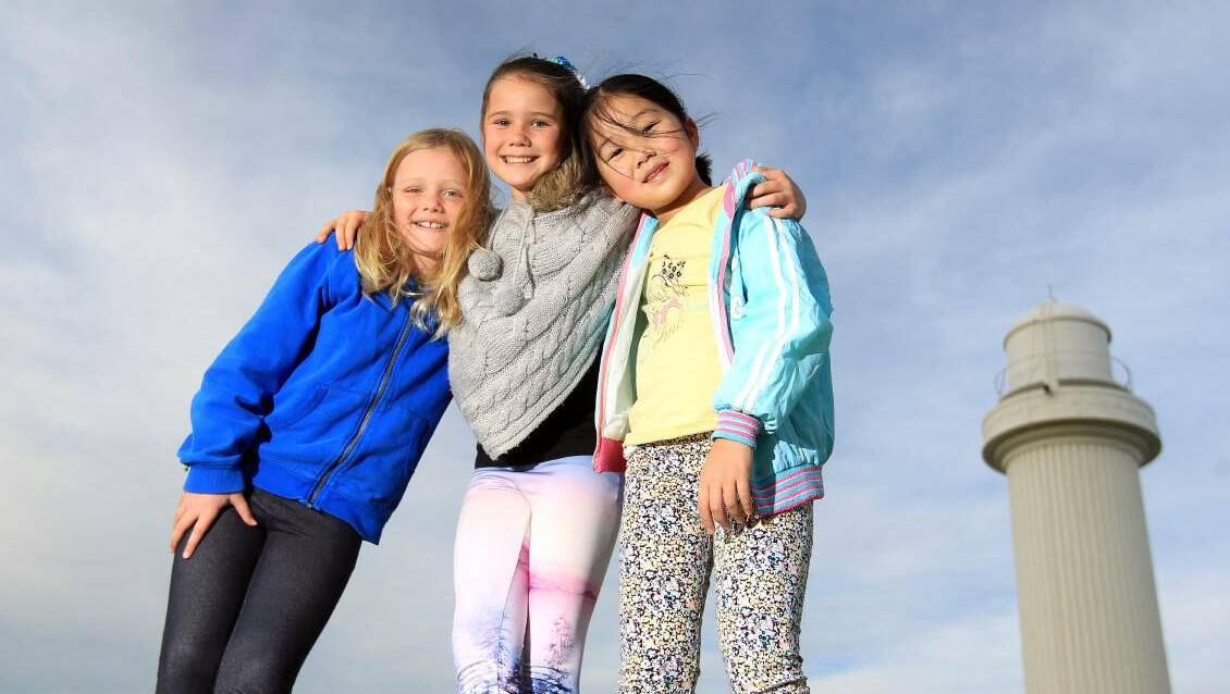 WORDSMITHS: Rachel, Holly and Grace are taking on Australia's best young spellers in The Great Australian Spelling Bee. Picture: SYLVIA LIBER