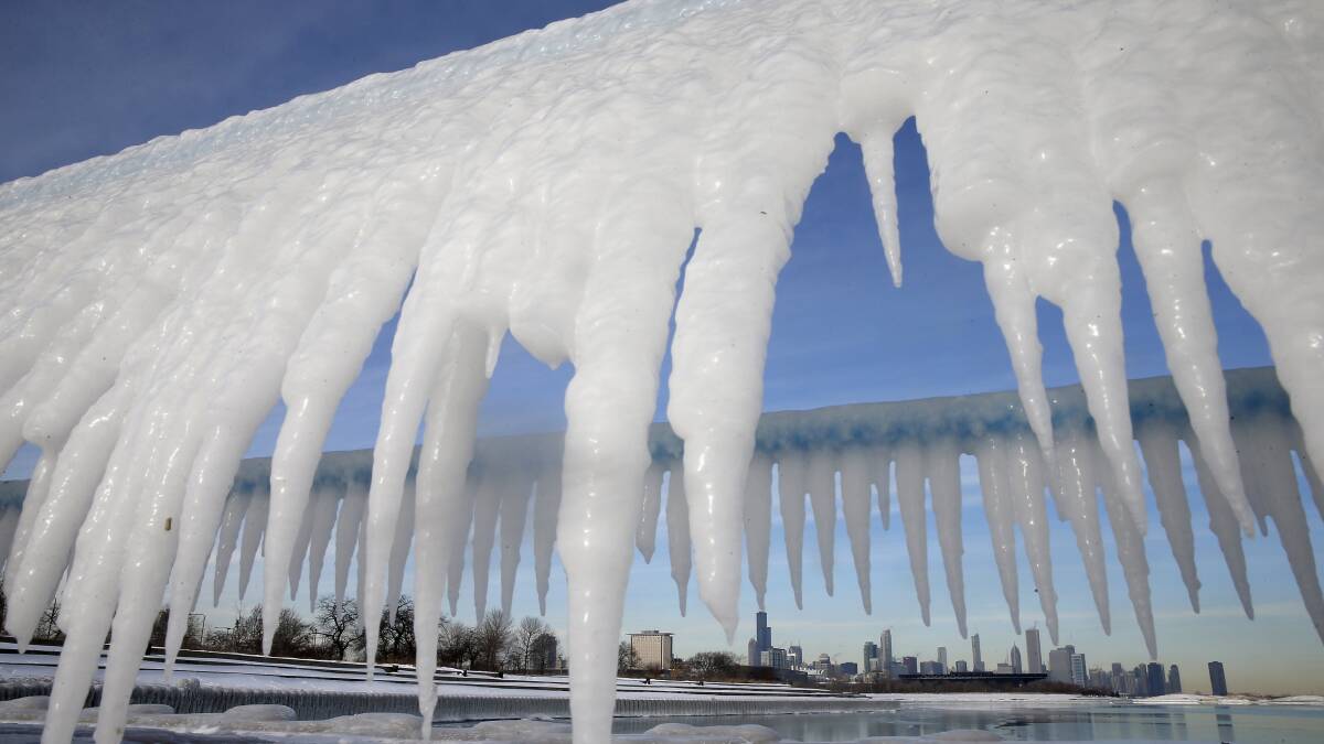 The Chicago skyline is framed by icicles in Chicago, Illinois, January 8, 2014. Photo: REUTERS/Jim Young.