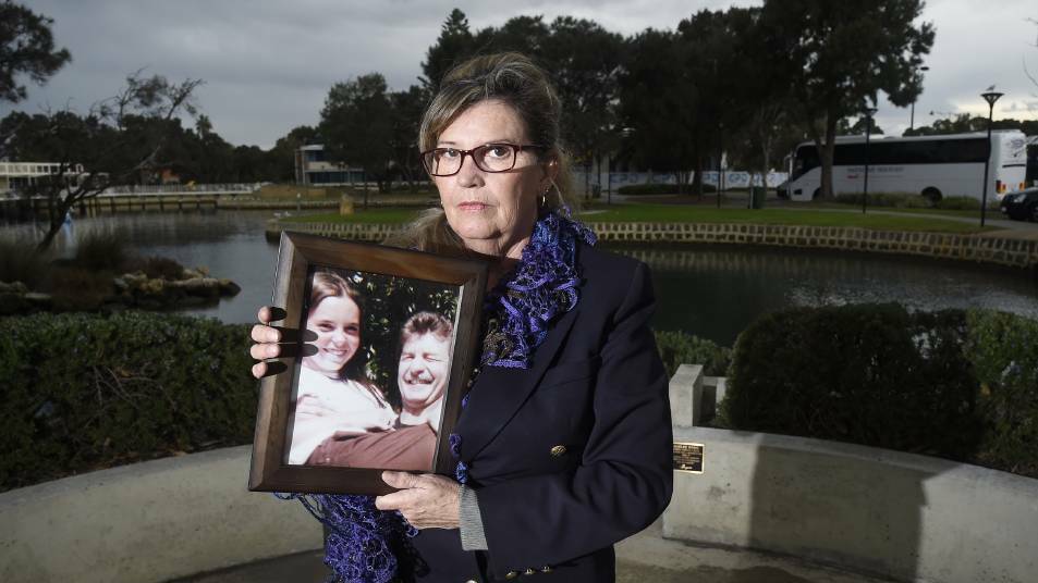 Margaret Dodd, pictured with a photo of Hayley Dodd and her father Raymond, doesn't want to spend another anniversary without knowing where her daughter's remains are. Picture: Richard Polden
