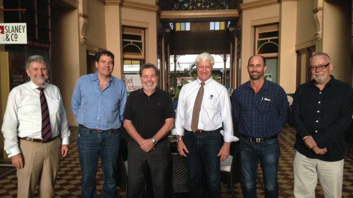 Bob Katter and Clean Energy Finance Corporation CEO Oliver Yates (second from left), in Charters Towers following a meeting to discuss renewable energy projects.
