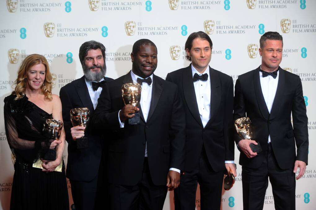 Producers Dede Gardner, Anthony Katagas, director Steve McQueen, producers Jeremy Kleiner and Brad Pitt, winners of the Best Film award. Photo: GETTY IMAGES