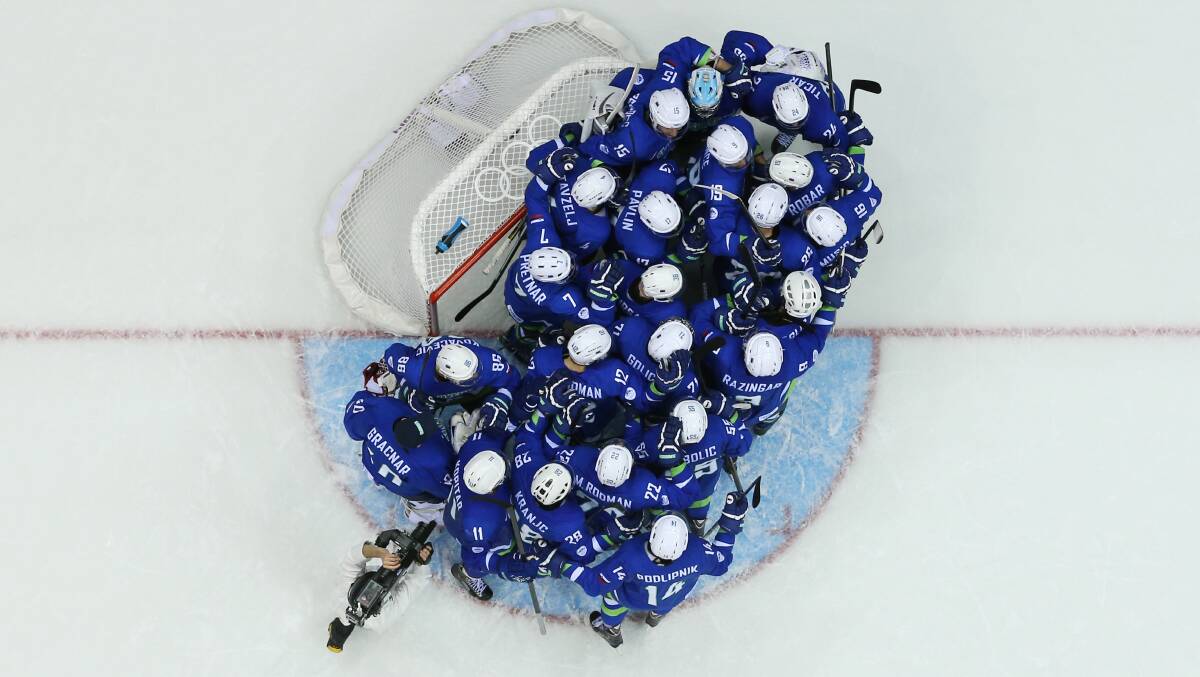 Slovenia celebrates after defeating Slovakia 3-1 during the Men's Ice Hockey Preliminary Round Group A game on day eight of the Sochi 2014 Winter Olympics at Bolshoy Ice Dome on February 15, 2014 in Sochi, Russia. Photo: GETTY IMAGES
