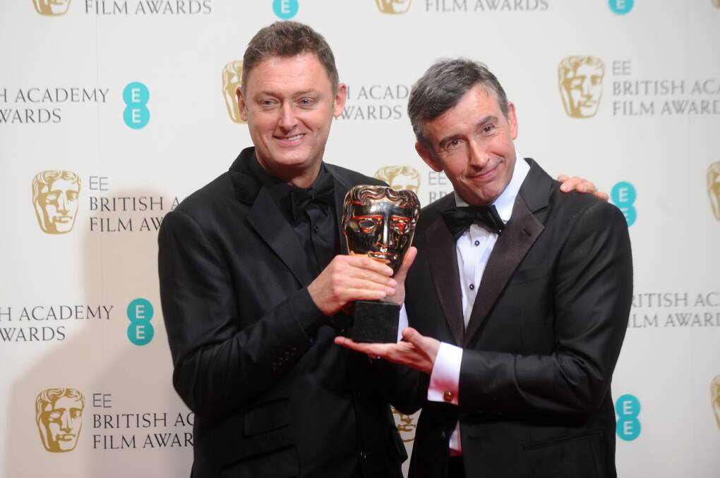 Screenwriters Jeff Pope and Steve Coogan, winners of the Adapted Screenplay award. Photo: GETTY IMAGES