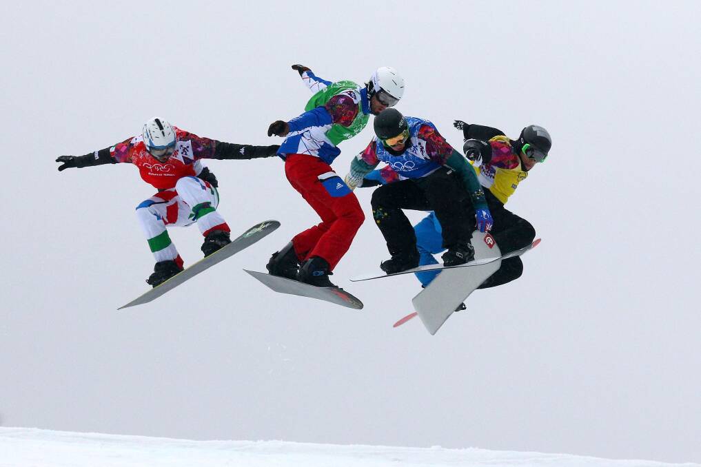 Omar Visintin of Italy (red bib), Pierre Vaultier of France (green bib), Jarryd Hughes of Australia (blue bib), Hanno Douschan of Austria (white bib) and Konstantin Schad of Germany (yellow) compete in the Men's Snowboard Cross Quarterfinals on day eleven of the 2014 Winter Olympics at Rosa Khutor Extreme Park on February 18, 2014 in Sochi, Russia. Photo: GETTY IMAGES