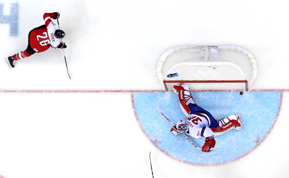 Thomas Vanek #26 of Austria hits the post against Lars Haugen #30 of Norway during the Men's Ice Hockey Preliminary Round Group B game on day nine of the Sochi 2014 Winter Olympics at Bolshoy Ice Dome on February 16, 2014 in Sochi, Russia. Photo: GETTY IMAGES