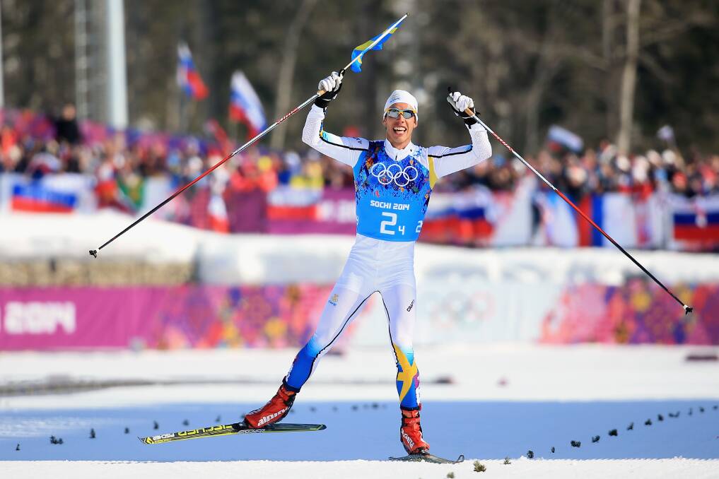 Marcus Hellner of Sweden celebrates winning the gold medal in the Cross Country Men's 4 x 10 km Relay during day nine of the Sochi 2014 Winter Olympics at Laura Cross-country Ski & Biathlon Center on February 16, 2014 in Sochi, Russia. Photo: GETTY IMAGES