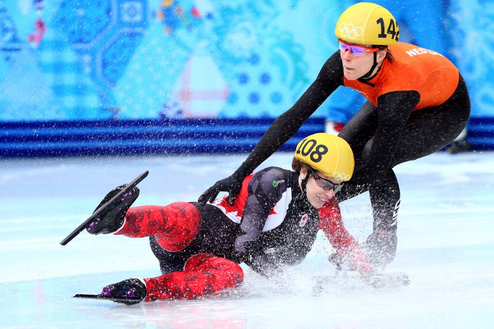 Marianne St. Gelais of Canada falls while competing in the Short Track Ladies' 1000m Heat at Iceberg Skating Palace on day 11 of the 2014 Sochi Winter Olympics on February 18, 2014 in Sochi, Russia. Photo: GETTY IMAGES