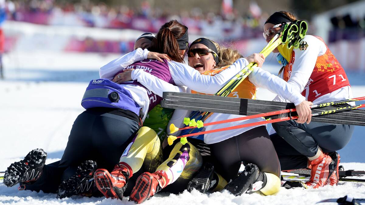 Germany cross country skiers celebrate winning the bronze medal in the Women's 4 x 5 km Relay during day eight of the Sochi 2014 Winter Olympics at Laura Cross-country Ski & Biathlon Center on February 15, 2014 in Sochi, Russia. Photo: GETTY IMAGES