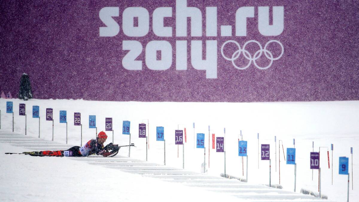 Nathan Smith of Canada competes at the shooting range in the Men's 15 km Mass Start during day 11 of the Sochi 2014 Winter Olympics at Laura Cross-country Ski & Biathlon Center on February 18, 2014 in Sochi, Russia. Photo: GETTY IMAGES