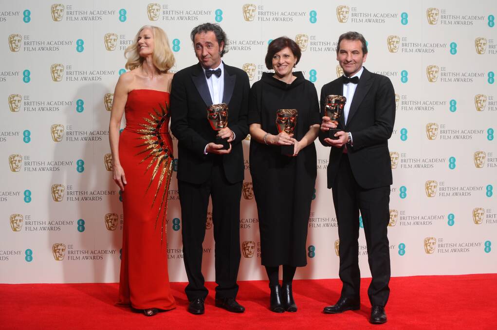 (2ndL-R) Paolo Sorrentino, Francesca Cima and Nicola Giuliano, winners of the Best Film Not In The English Language award, and actress Joely Richardson (L). Photo: GETTY IMAGES