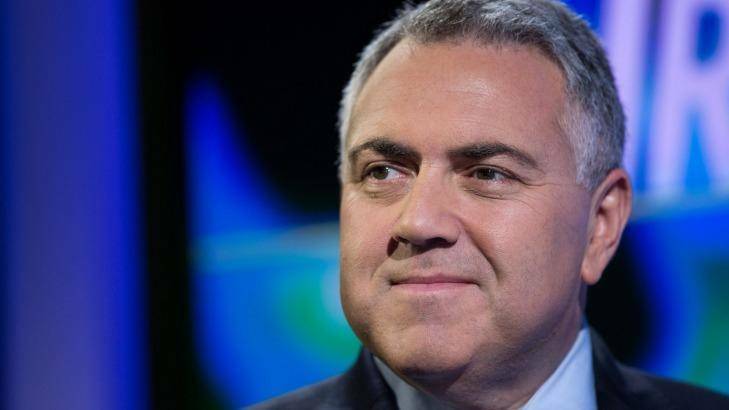 Joe Hockey has confirmed the change to GST on sanitary items remains on the table. Photo: Jerome Favre 