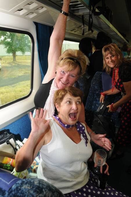 On board the Elvis Express as it stops in Orange were Yvonne Bourne and Dianne Elliott. Photo: STEVE GOSCH