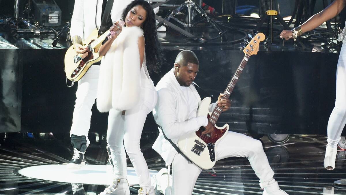 Nicki Minaj and Usher perform onstage during the 2014 MTV Video Music Awards. PHOTO: Getty Images