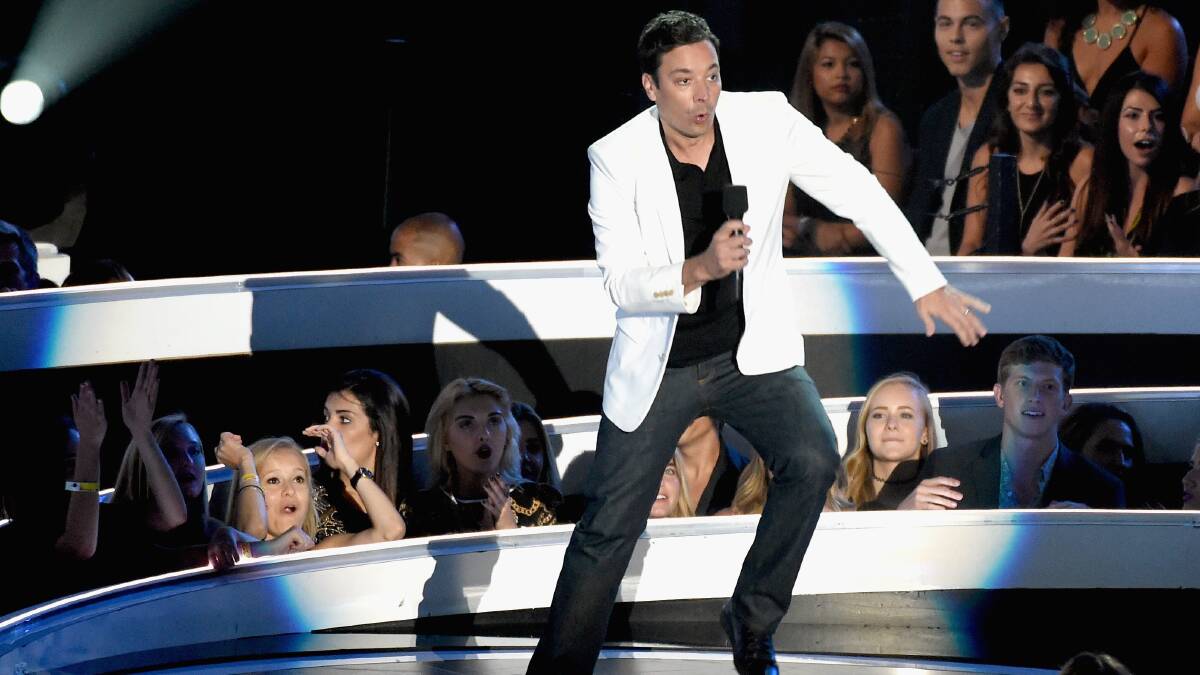 TV personality Jimmy Fallon speaks onstage during the 2014 MTV Video Music Awards. PHOTO: Getty Images