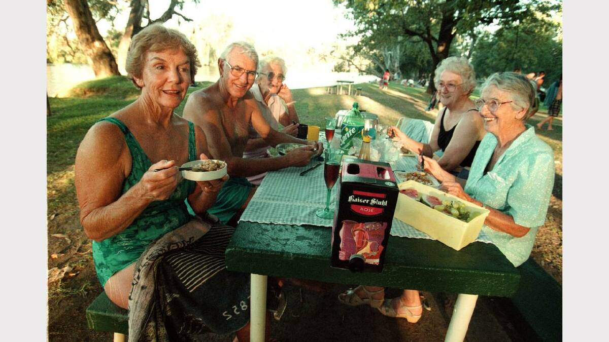Mary and Bert Fletcher, Win Brown, Sheila Townsend and Ruth Wynter enjoying a summer evening at Albury's Noreuil Park. Picture: PETER BATSON