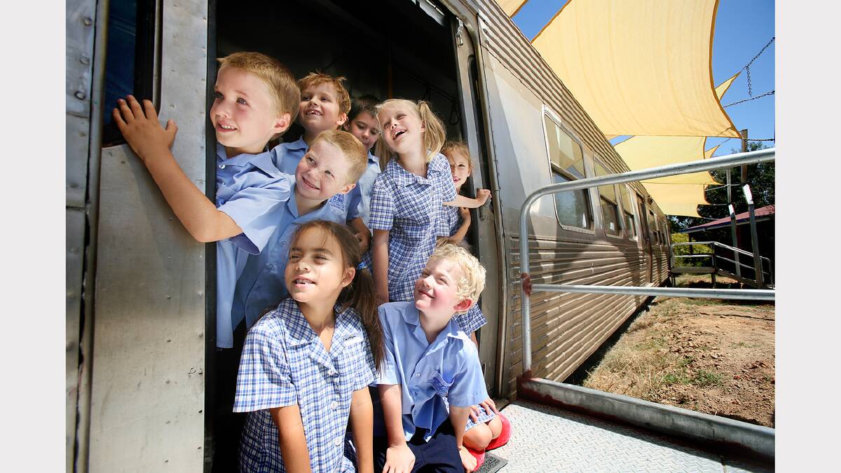 St John's Primary School at Jindera purchased an old train carriage and turned into a classroom, much to the delight of Joel Schoff, Kale Geraghty, Jole Hoffman, Jonathan Ridgway, Madelyn Van Emmerik and Zoe Briese. Picture: SIMON GROVES