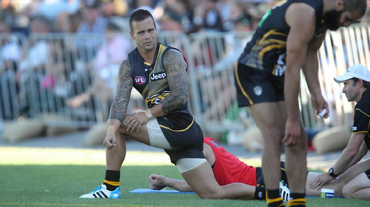 Jake King stretches on the bench. Picture: FAIRFAX
