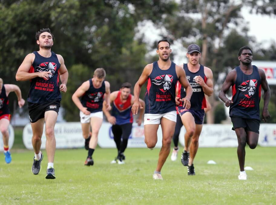 Wodonga Raiders recruits Jackson Clark, Jethro Calma-Holt and Ross Tungatalum lead the way during a sprint drill at training last night. Picture: JOHN RUSSELL
