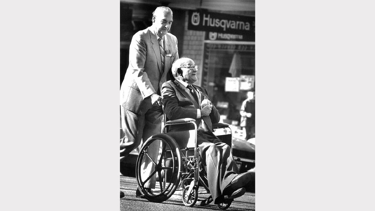 Jack Dempsey pushes mate Peter Jenkins during the 1988 Anzac Day parade.