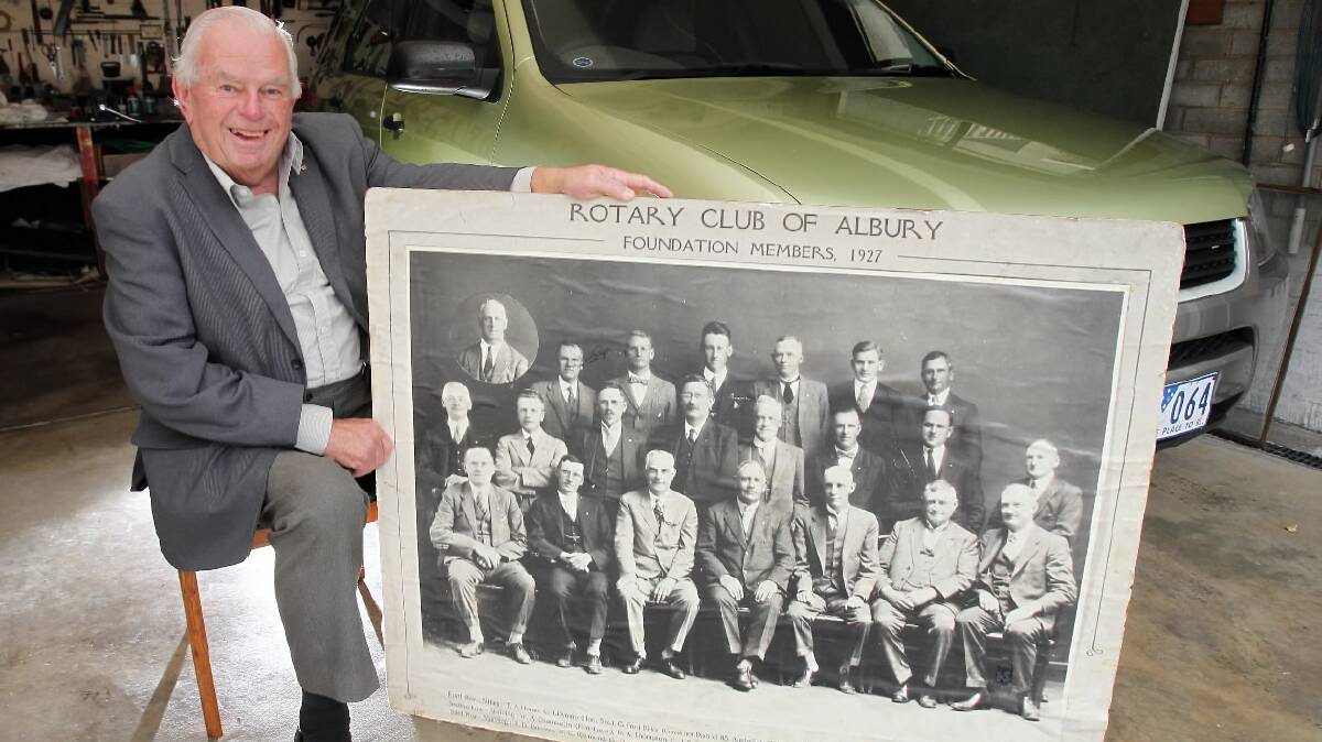 Mike Egan back at the scene of the crime with the historic Rotary photograph. Picture: KYLIE ESLER