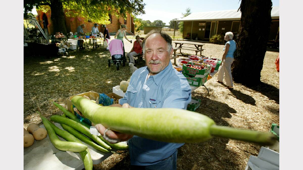 Market day at St John's Church, Thurgoona. Ross Parisella of Albury with guinea beans at his fruit and veg stall. Picture: MATTHEW SMITHWICK