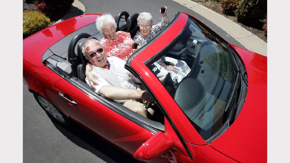 Darrell Martin in his Mercedes SLK convertible takes Norma Penman, 85, and Marlene Roberts, 71, all from Murray Gardens Retirement Estate, out for a spin for Valentines Day. Picture: KYLIE GOLDSMITH