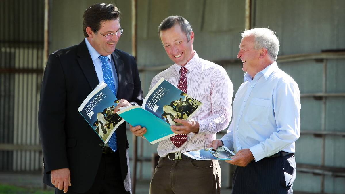Chairman of the dairy expansion project Stuart Crosthwaite and Murray Goulburn’s Ken Jones were on hand when Bill Tilley launched the strategy at Tallangatta yesterday. Picture: MATTHEW SMITHWICK 