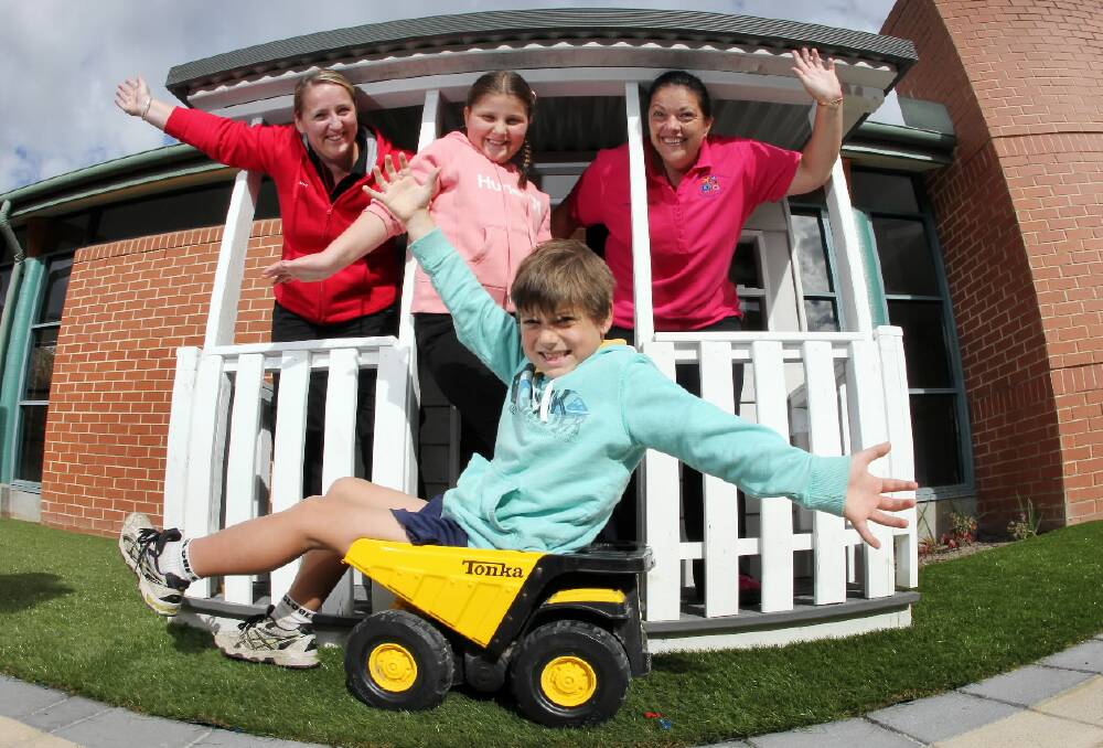 Flutterby Foundation founder Tanya Saunders, with her children Isabella and Jake Evans, 10 and 9, and nurse unit manager Samantha Peet were delighted yesterday that the new children’s playground was open. Picture: KYLIE ESLER