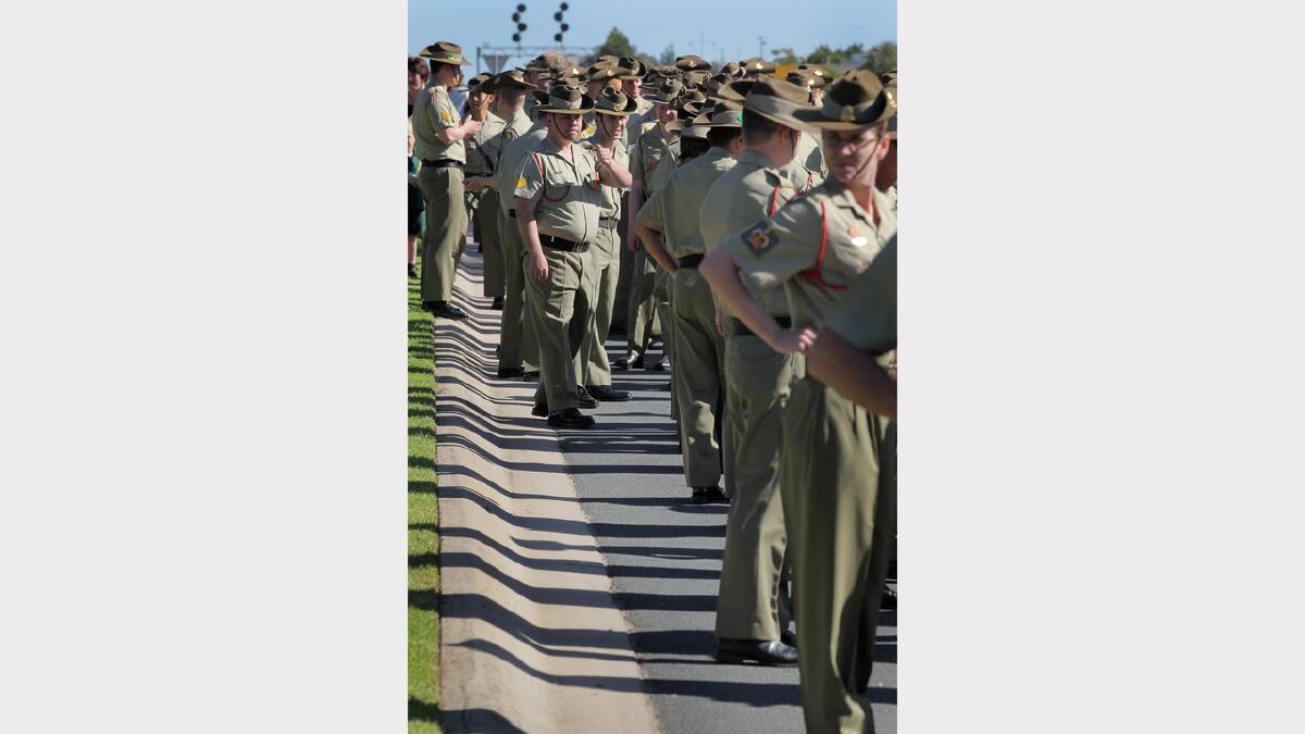 Wodonga Anzac Day march. Army personnel wait for the parade to begin.